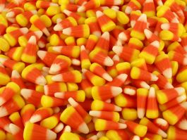 12 votive/'s in candy corn highly scented or pick another scent